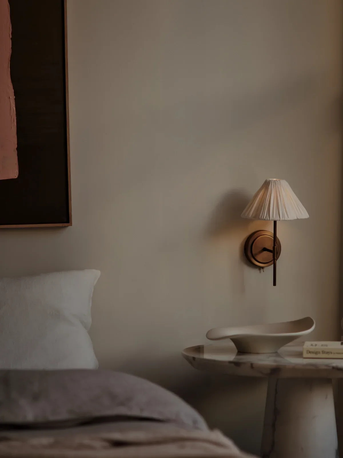 Lindi - aged brass and linen scalloped wall light