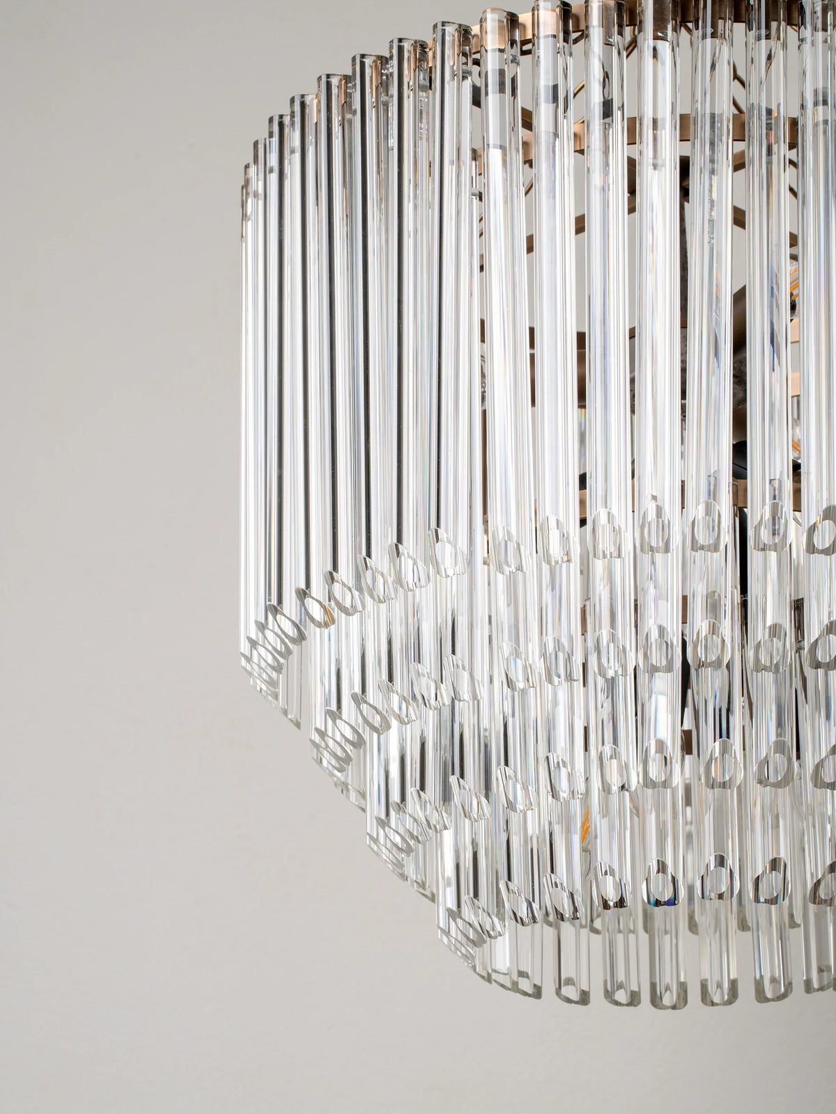 Petalia - 9 light aged brass and clear glass tube tall chandelier