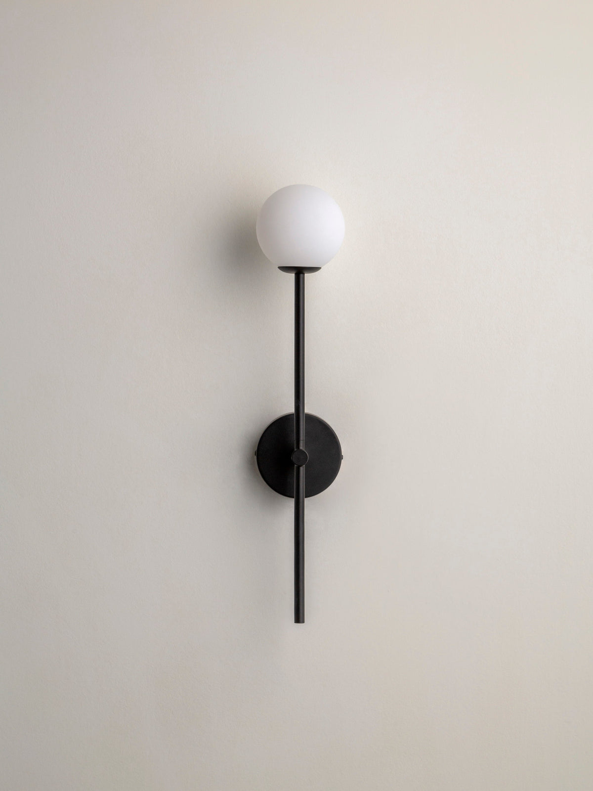 Chelvara - matt black and opal wall light