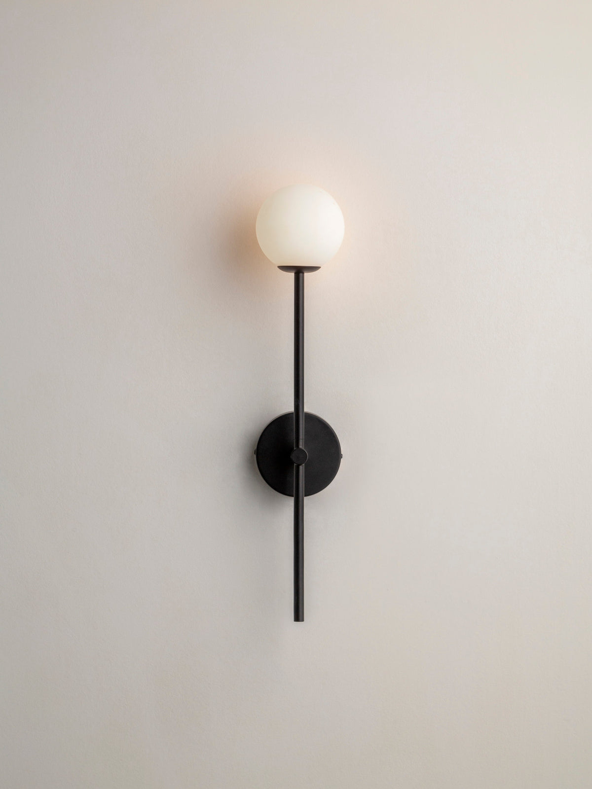 Chelvara - matt black and opal wall light