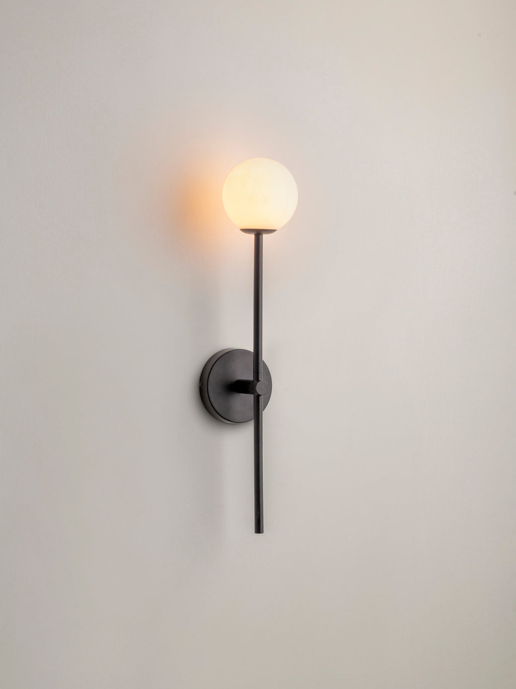 Chelvara - matt black and opal wall light